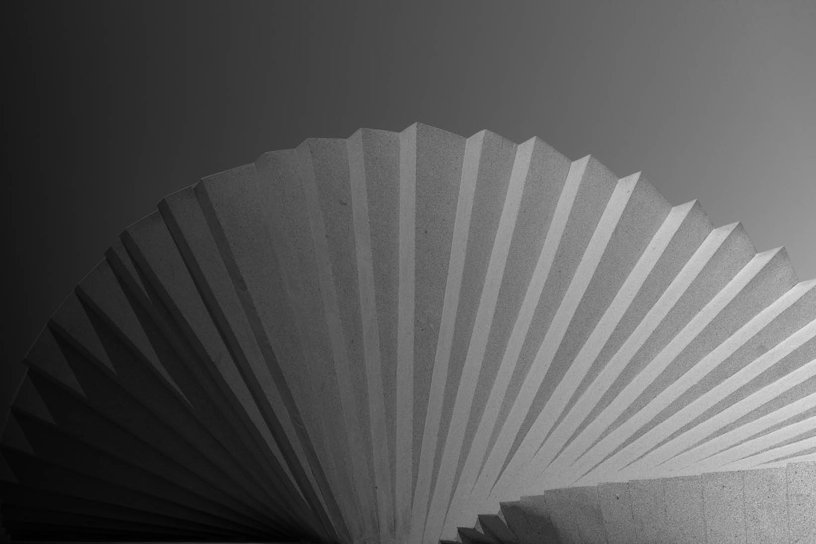 Abstract spiral architectural structure with repeating geometric lines, symbolizing achievement, progress, and continuous growth - Used on Capco Awards – Industry Recognition and Achievements