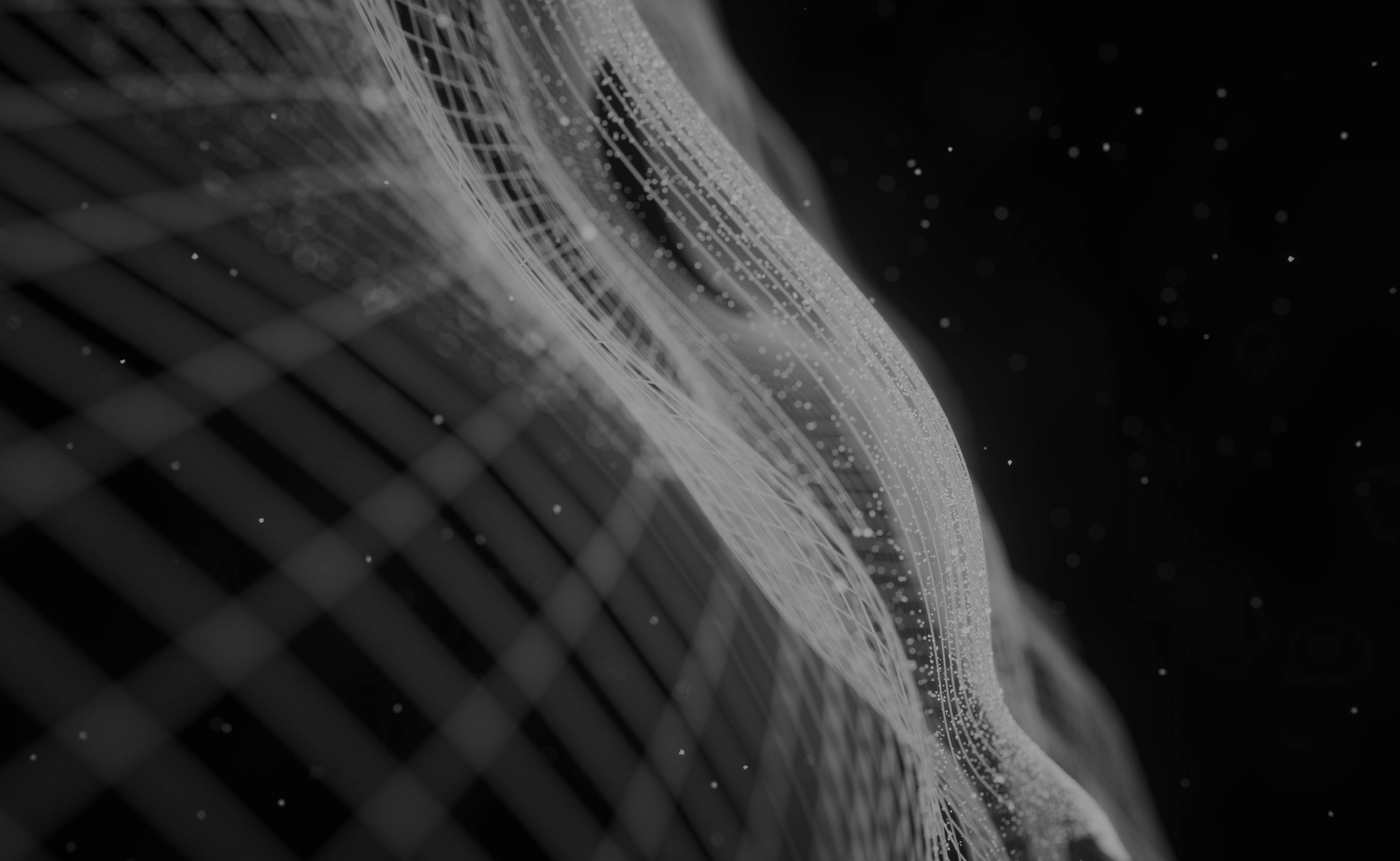 Abstract wireframe wave with glowing particles on a dark background.