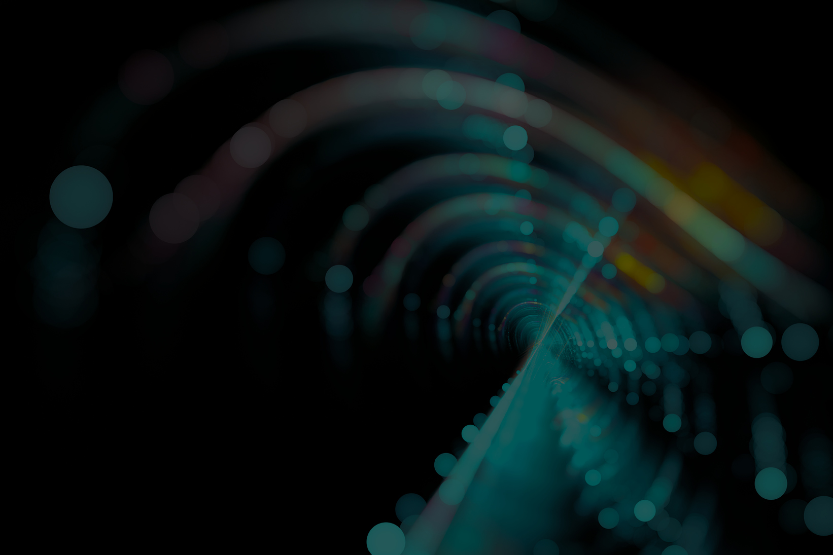 Abstract digital tunnel with glowing teal and multicolored light particles.